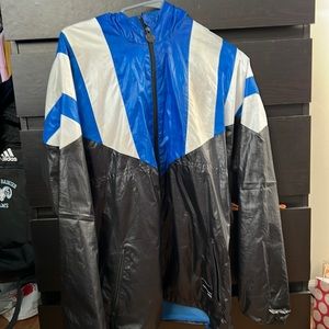 Adidas windbreaker. Not worn a ton. Few black markings in the white
